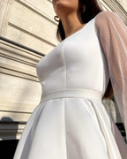 Rochie de mireasa alba lunga din satin eleganta cu slit si maneci transparente