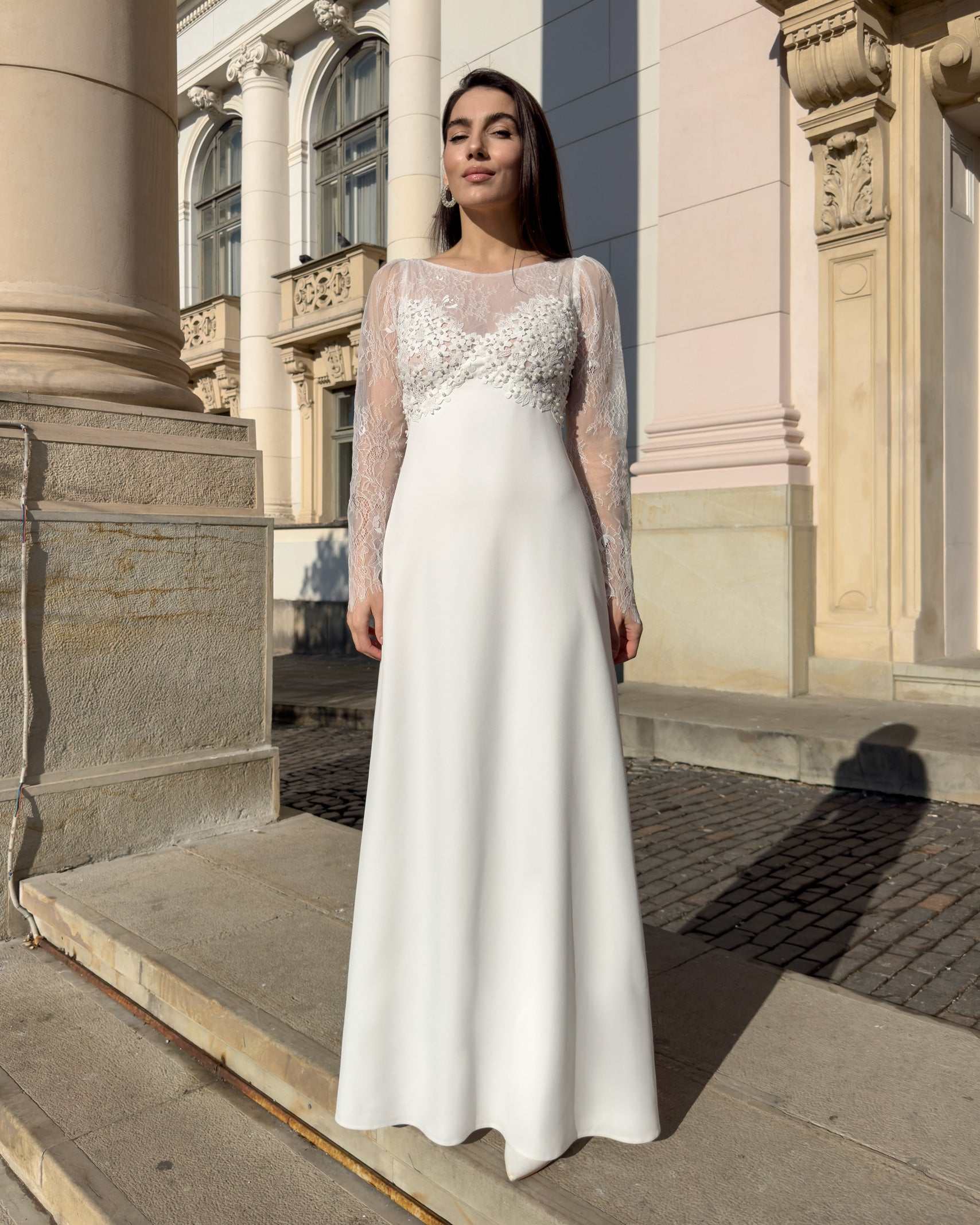 Robe de mariée élégante à manches en dentelle