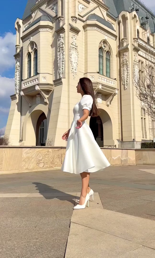 Robe blanche élégante pour les occasions spéciales 