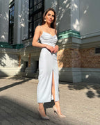 Rochie albastra eleganta cu slit, pliuri, decolteu mic, din crep elastic, pentru evenimente speciale.